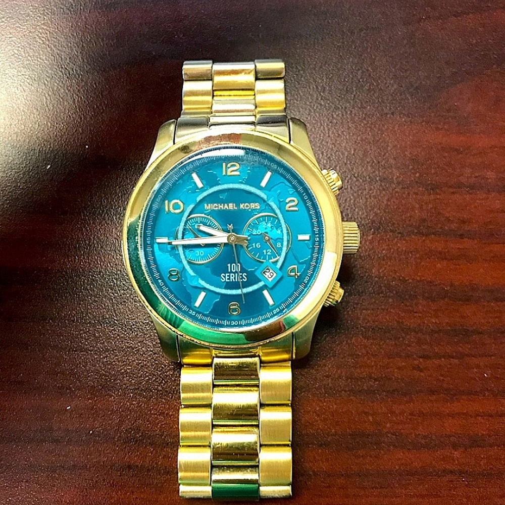 EUC MICHAEL KORS GOLD FIGHT HUNGER WATCH LIMITED EDITION